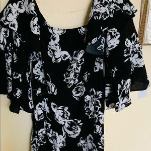 Olivaceous top with Raffle sleeves black color floral white print